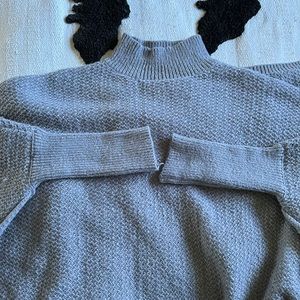 Grey turtleneck oversized poncho sweater